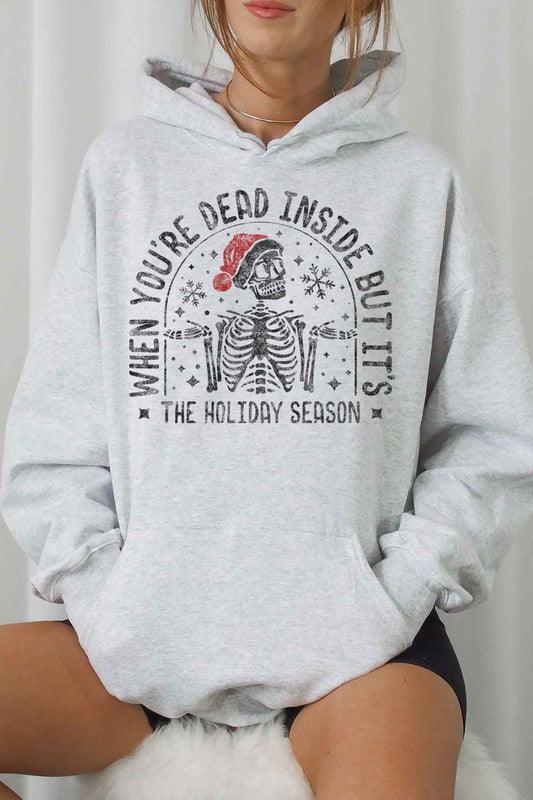 CHRISTMAS SKELETON GRAPHIC HOODIE.