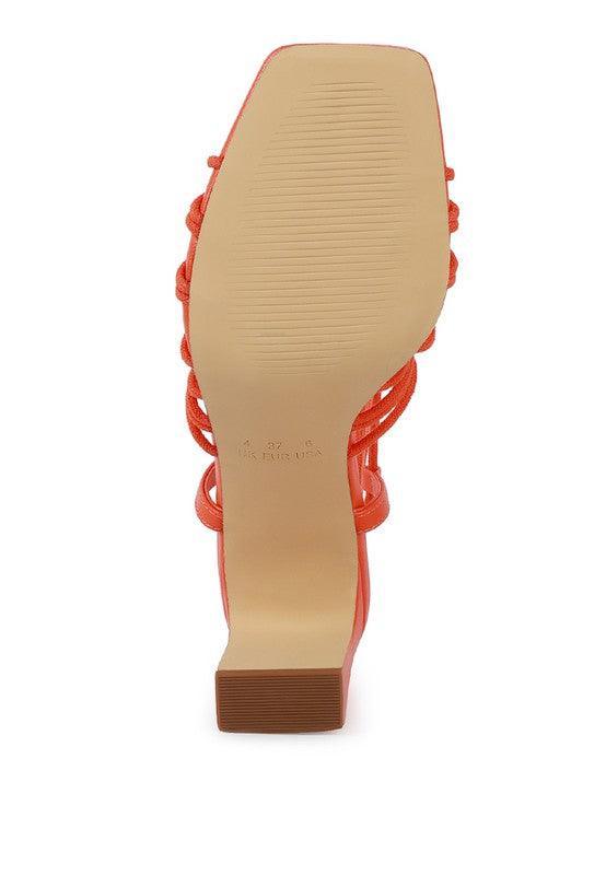 STRINGS ATTACH BRAIDED TIE UP BLOCK HEELED SANDAL.