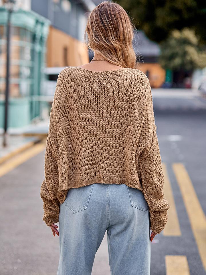 Round Neck Cable-Knit Sweater.