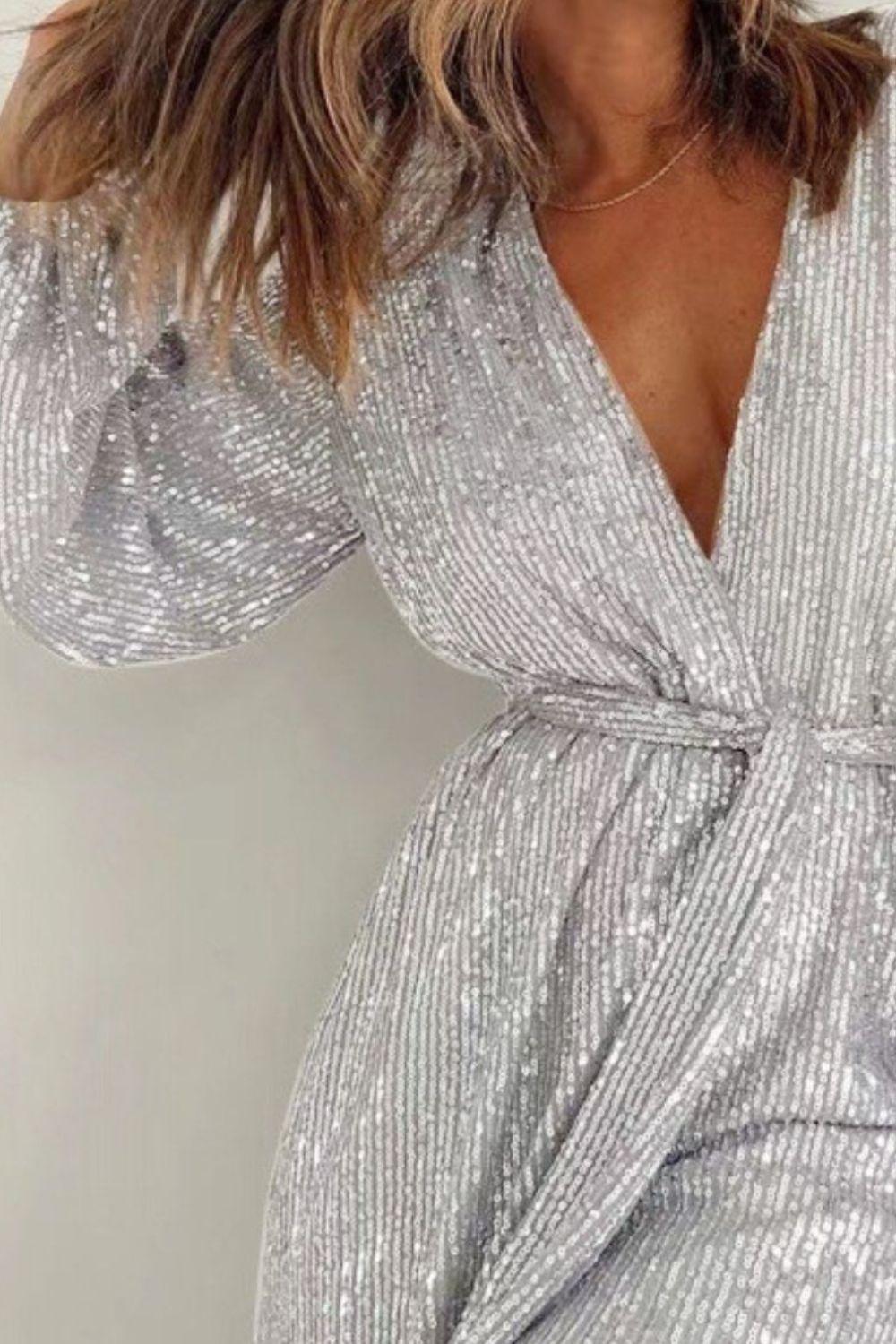 Full Size Sequin Surplice Tie Waist Long Sleeve Romper.