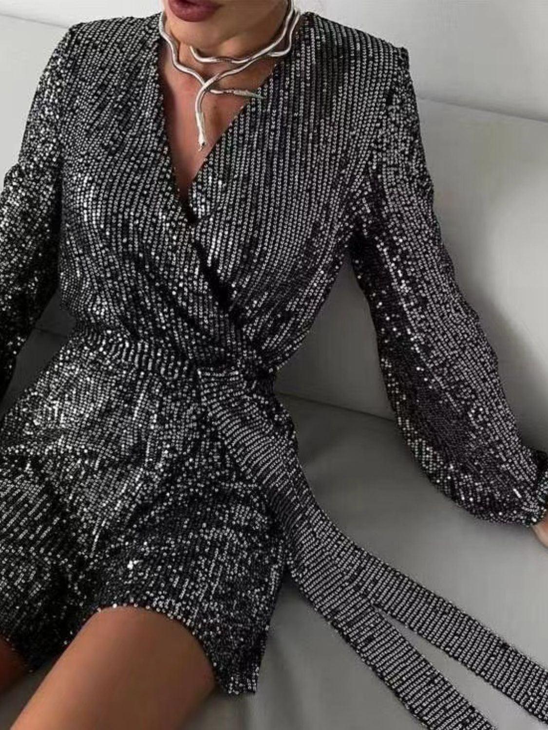 Full Size Sequin Surplice Tie Waist Long Sleeve Romper.