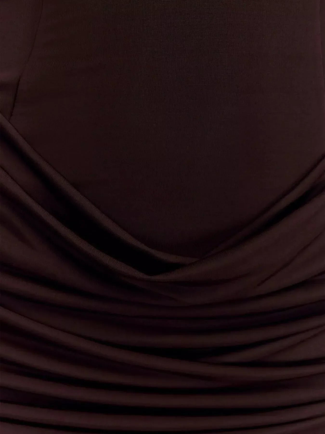 Lightweight polyester fabric with ruched texture and slight stretch