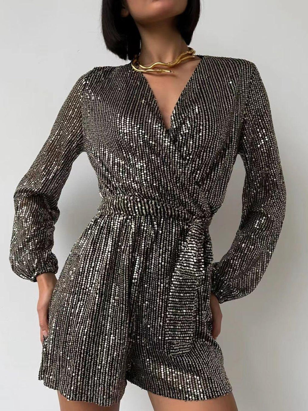 Full Size Sequin Surplice Tie Waist Long Sleeve Romper.