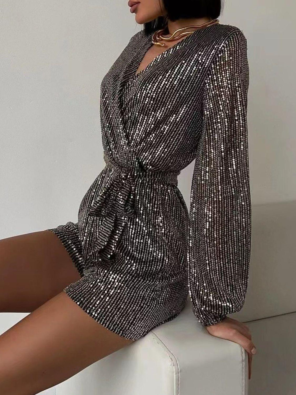 Full Size Sequin Surplice Tie Waist Long Sleeve Romper.
