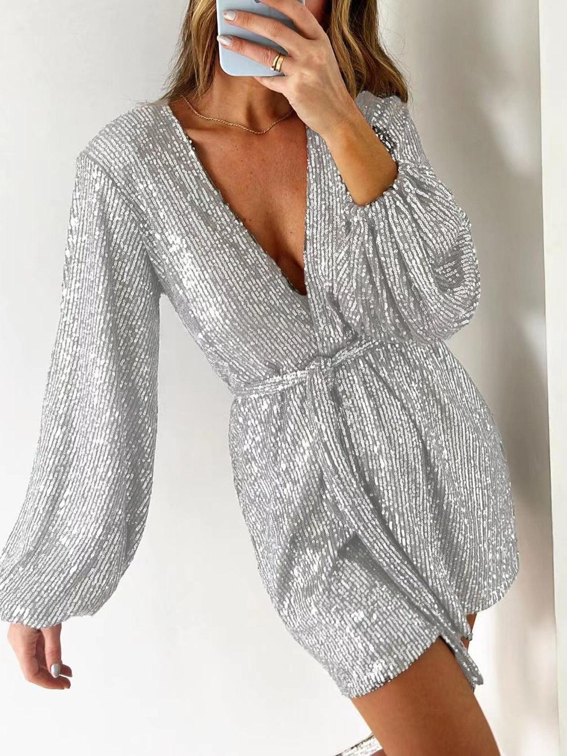 Full Size Sequin Surplice Tie Waist Long Sleeve Romper.