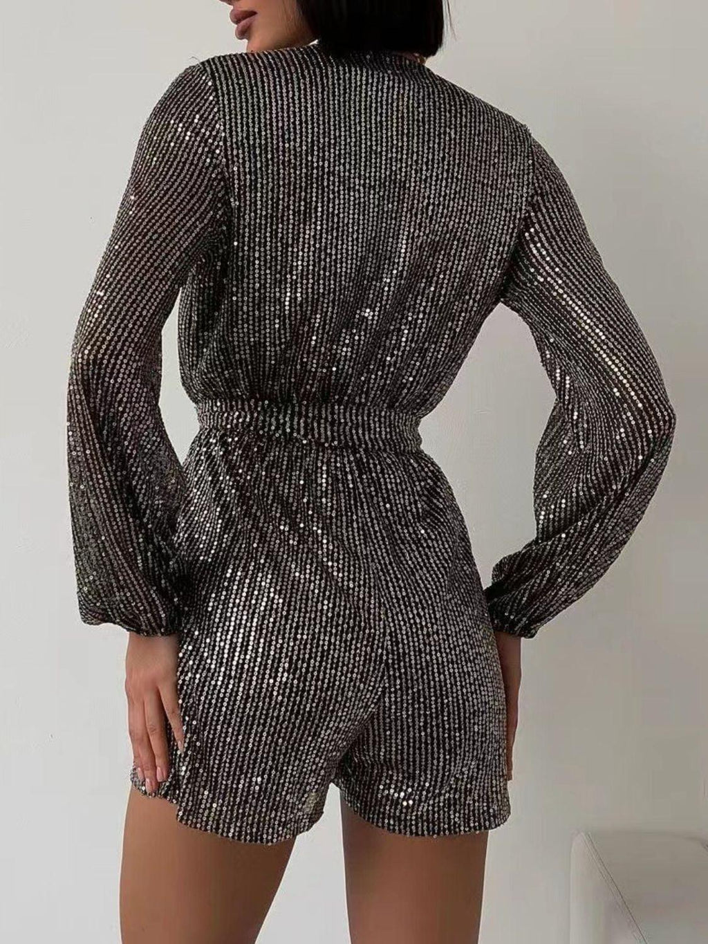 Full Size Sequin Surplice Tie Waist Long Sleeve Romper.