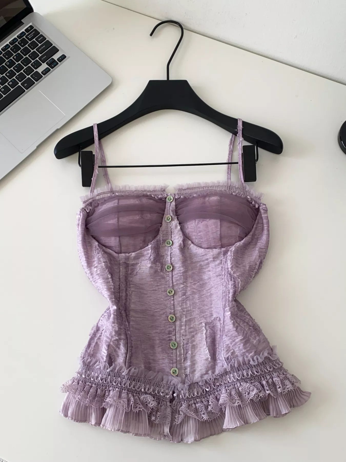 Lace-Trimmed Ruffled Hem Cami Tank Top in purple, front view showing button placket and delicate lace hem detail