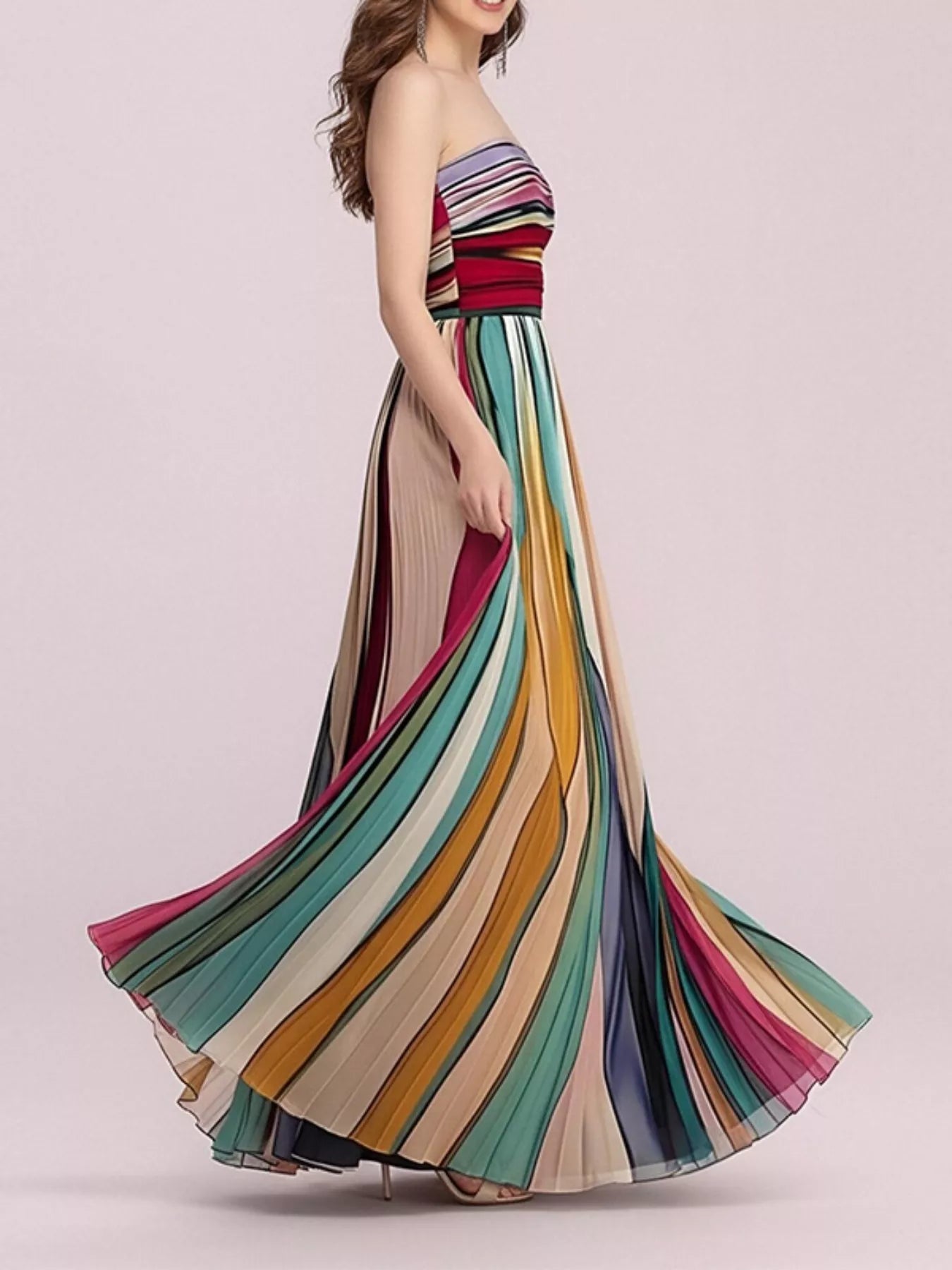 Side profile of the Striped Pleated Tube Maxi Dress, showing the fitted strapless bodice and the full pleated A-line skirt sweep.