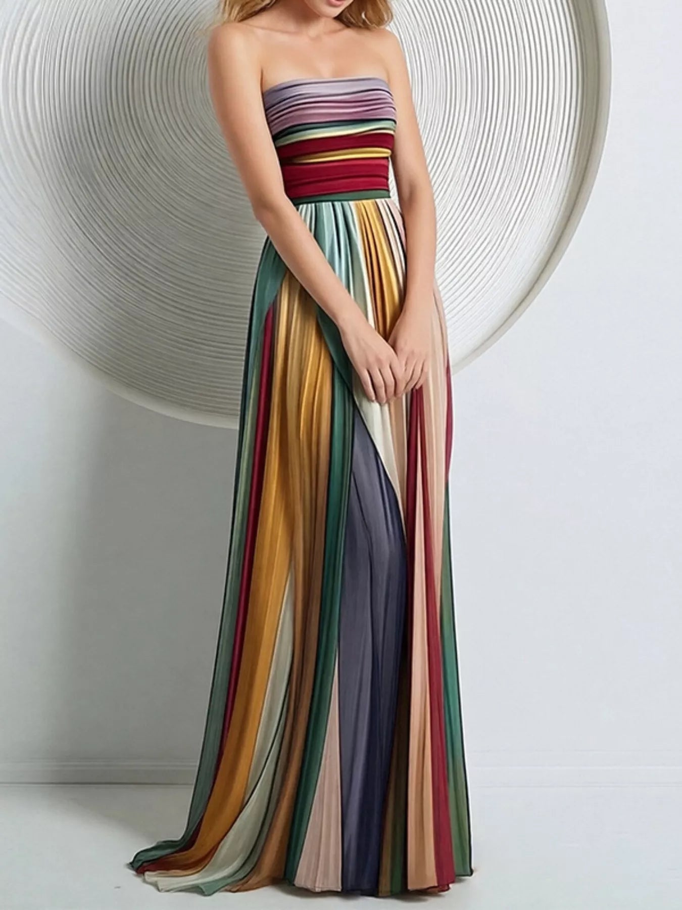 Close view of the Striped Pleated Tube Maxi Dress bodice, showing the horizontal-pleated strapless neckline and the burgundy and gold banded waist.