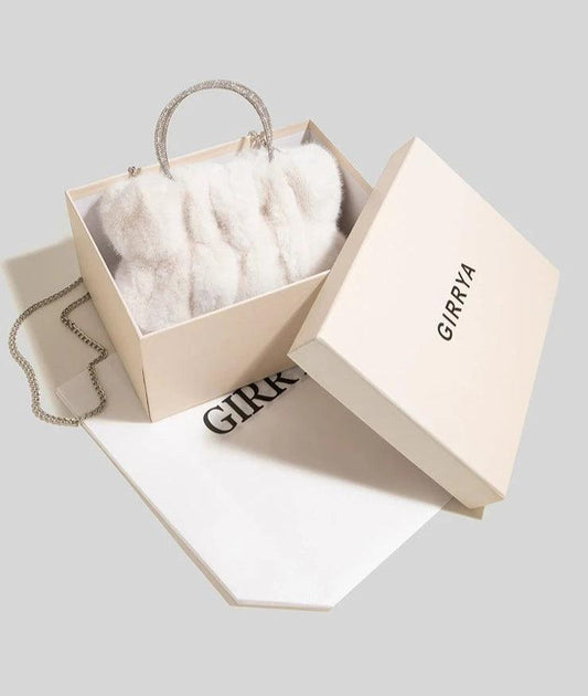 Soft Plush Faux Fur Style Crossbody Bag in Horizontal Square shape with Chain single sling with Magnetic buckle opening. Comes with gift box & gift bag.  Available in; White, Turquoise, Pink, Purple, Brown, Black. 