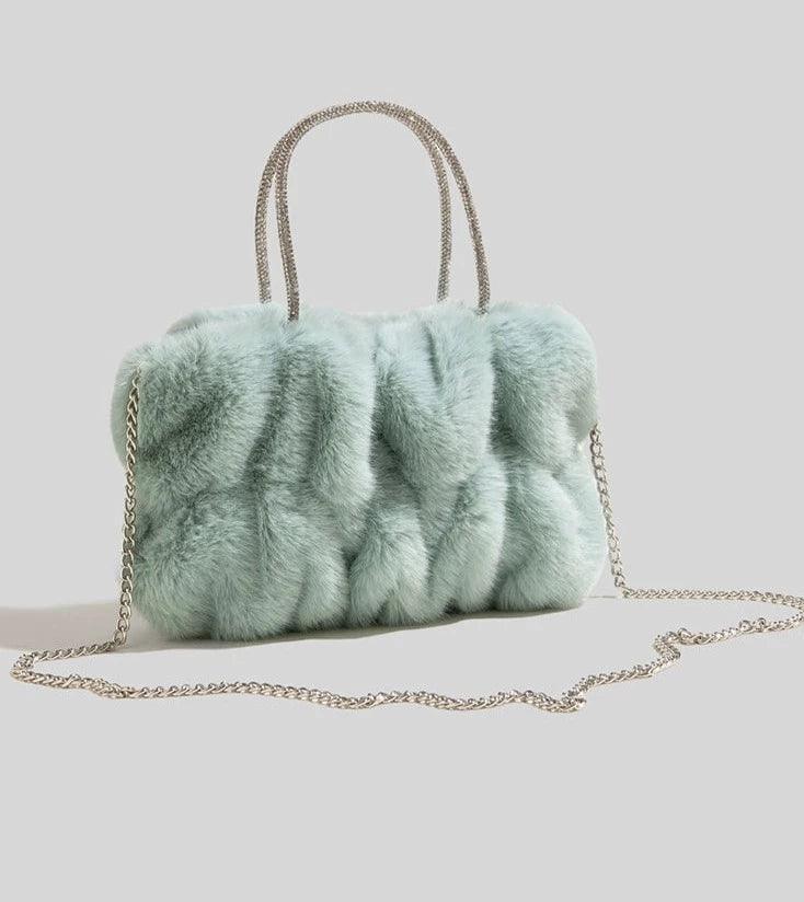 Soft Plush Faux Fur Style Crossbody Bag in Horizontal Square shape with Chain single sling with Magnetic buckle opening. Comes with gift box & gift bag.  Available in; White, Turquoise, Pink, Purple, Brown, Black. 