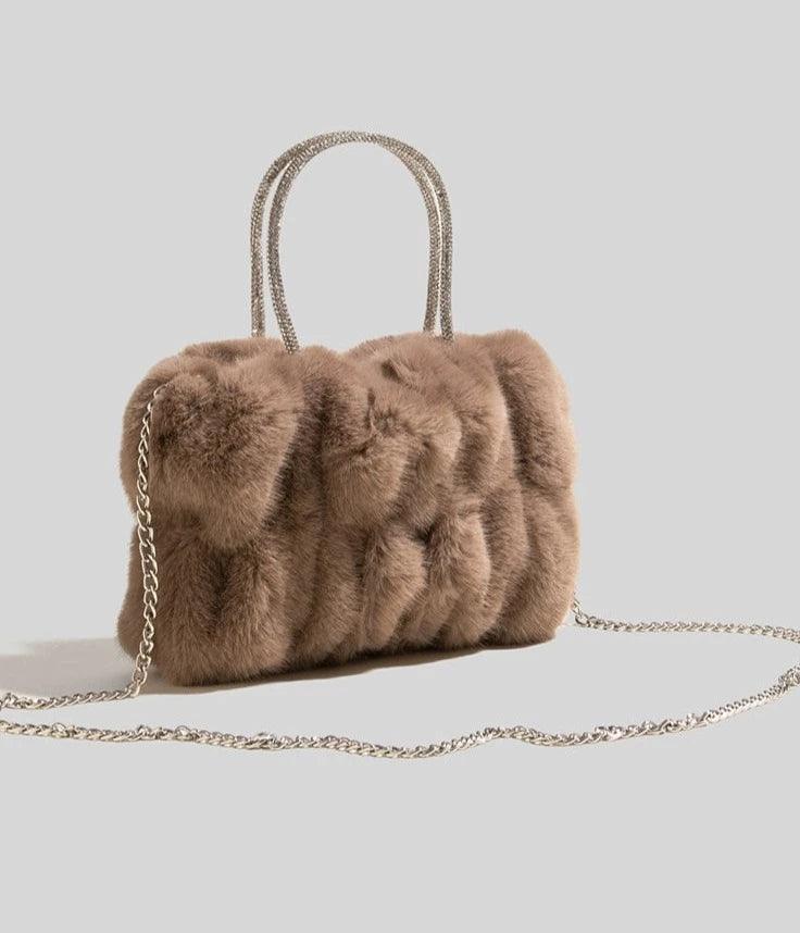 Soft Plush Faux Fur Style Crossbody Bag in Horizontal Square shape with Chain single sling with Magnetic buckle opening. Comes with gift box & gift bag.  Available in; White, Turquoise, Pink, Purple, Brown, Black. 