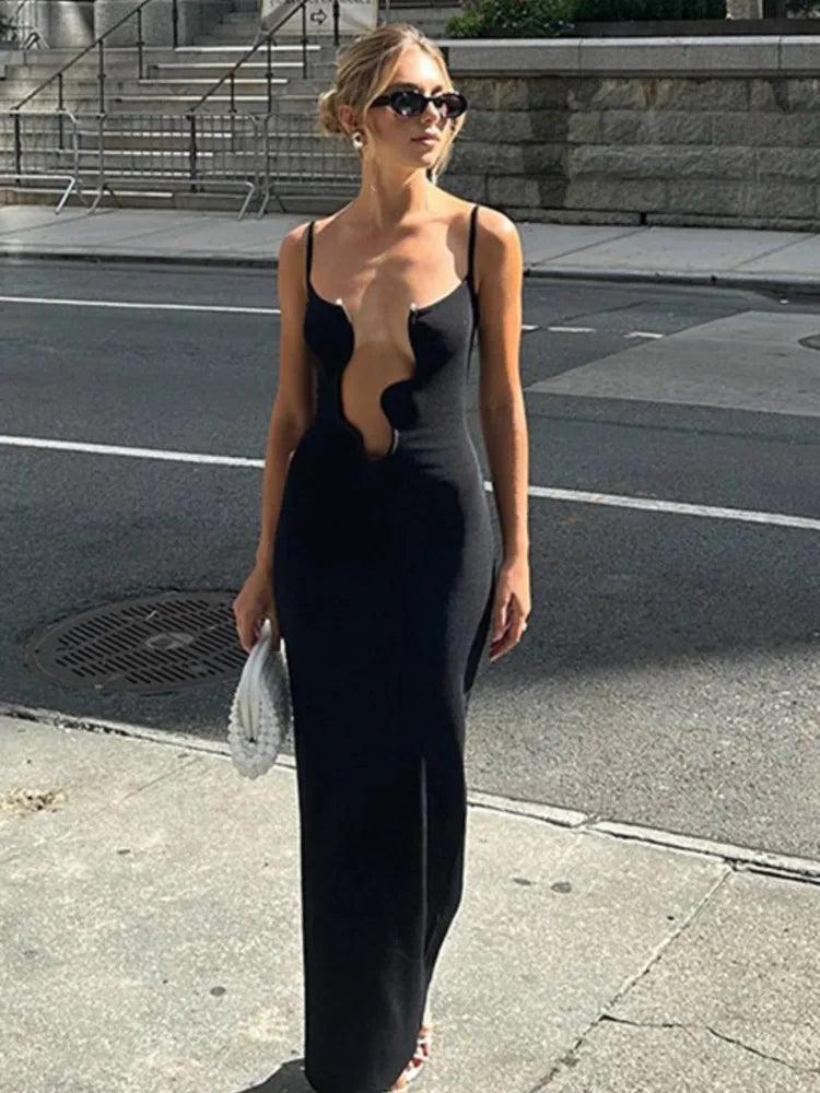 Women's Ankle-Length Sleeveless Dress – Deep V-Neck, Pleated Skirt, Sheath Fit.