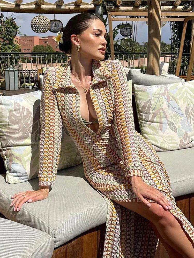 Multicolor crochet maxi dress, fabric and stitch detail close-up showing the bobble-stitch knit in pastel tones.