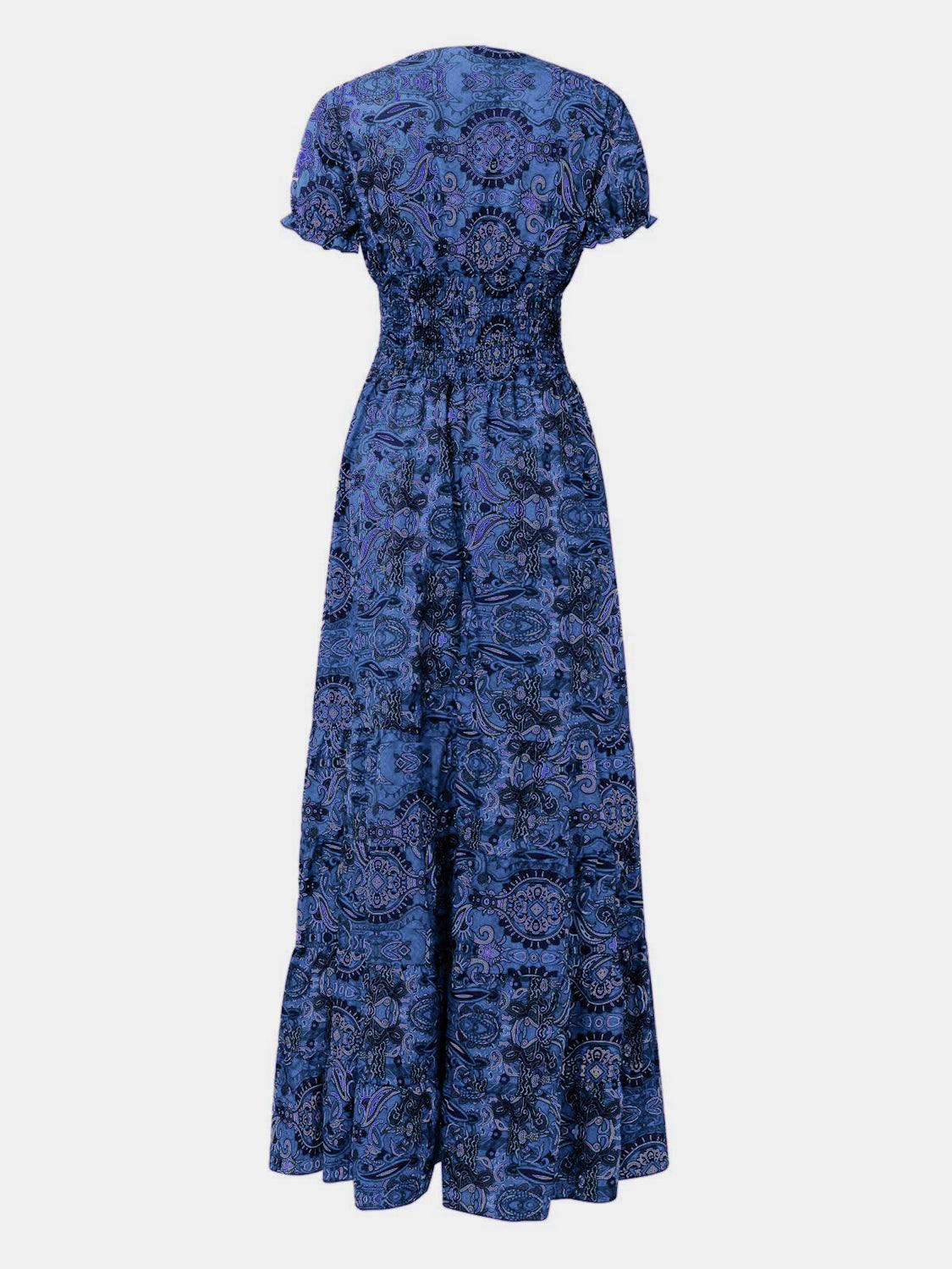 Olive paisley boho smocked maxi dress, mid-body view showing the smocked elastic bodice.