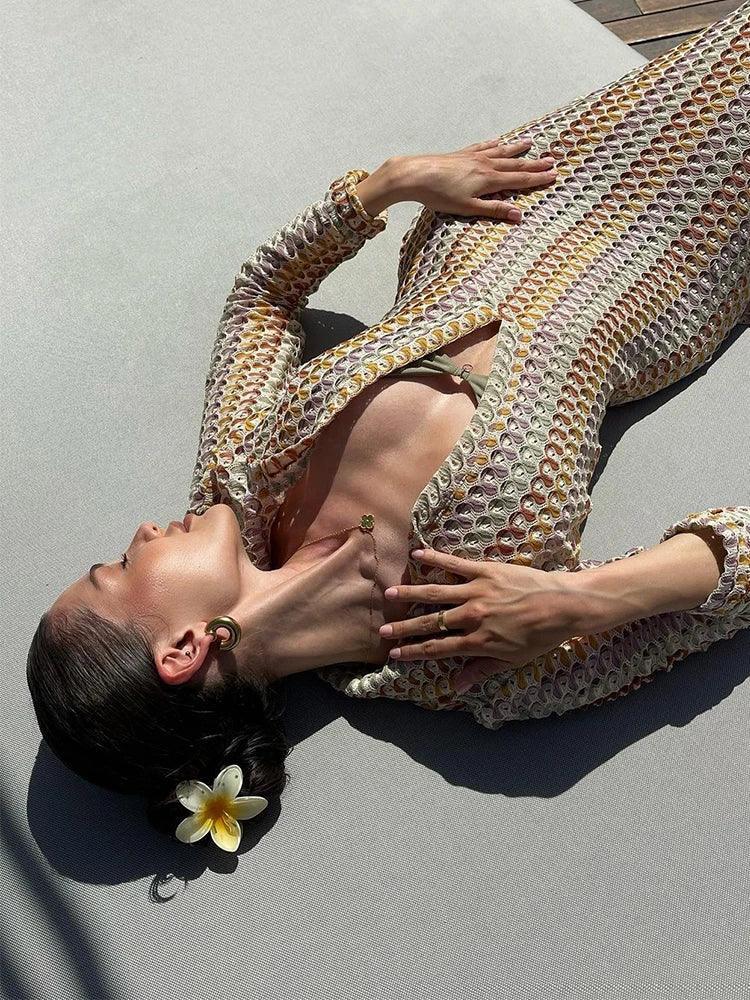 Pastel crochet maxi cover-up dress, side view showing the body-skimming silhouette and sleeve length.