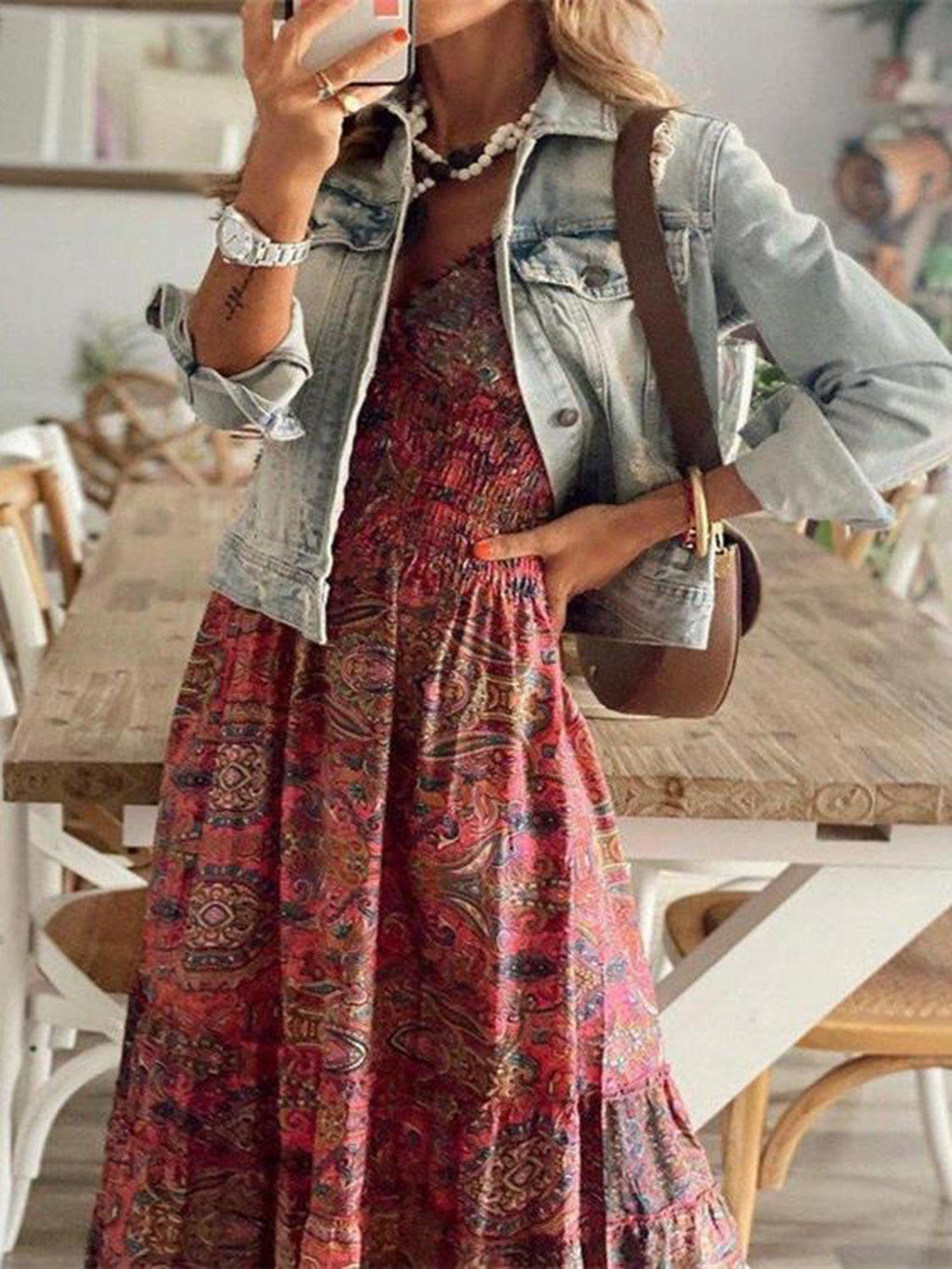 Red paisley smocked V-neck maxi dress, full-length view showing the bohemian silhouette and tiered floor-length skirt.