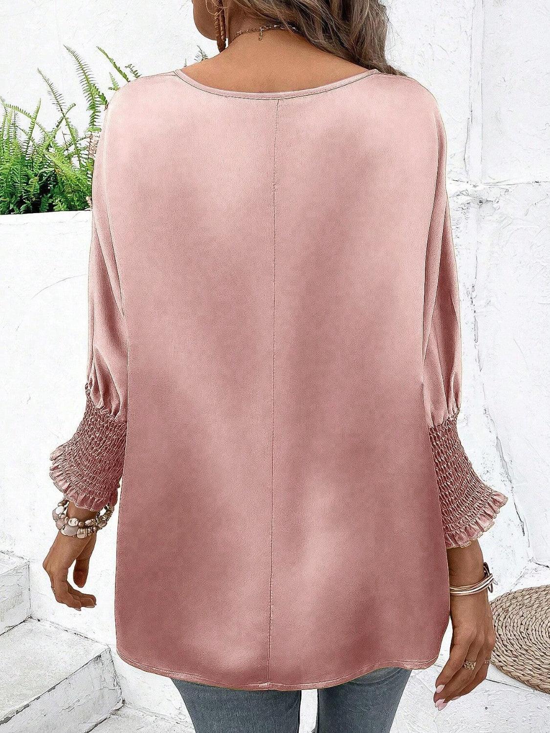 Satin Smocked Round Neck Three-Quarter Sleeve Top.