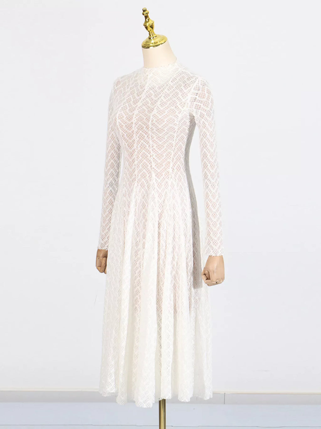 White lace mock-neck maxi dress, back view showing the concealed back zip closure and body-skimming silhouette.