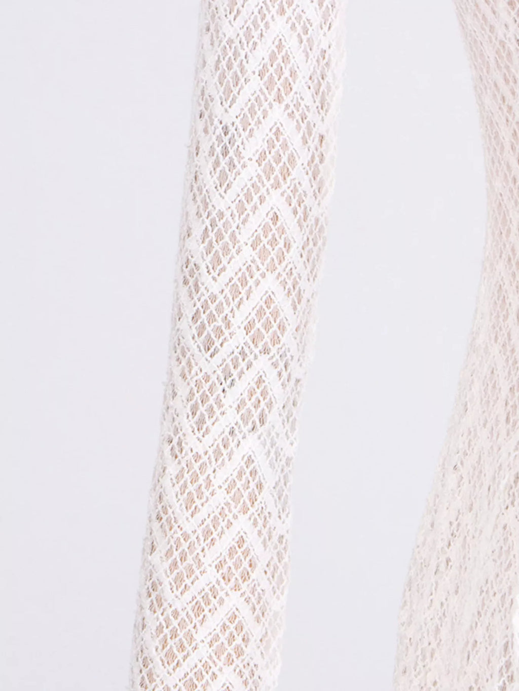 White lace mock-neck maxi dress, styled view with structured top-handle bag.