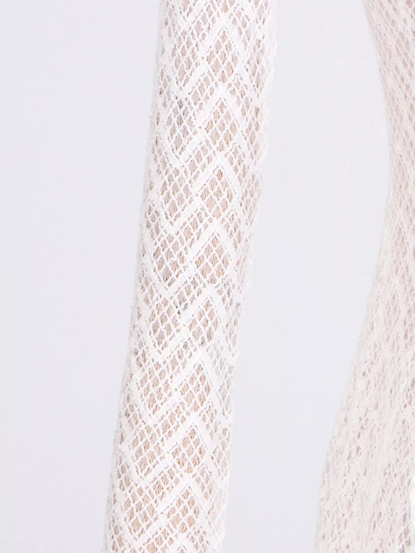 White lace mock-neck maxi dress, styled view with structured top-handle bag.
