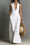 White sleeveless collared button-down maxi shirt dress, front view showing the pointed collar, full button placket, and floor-length skirt, styled with a wide-brim straw hat.