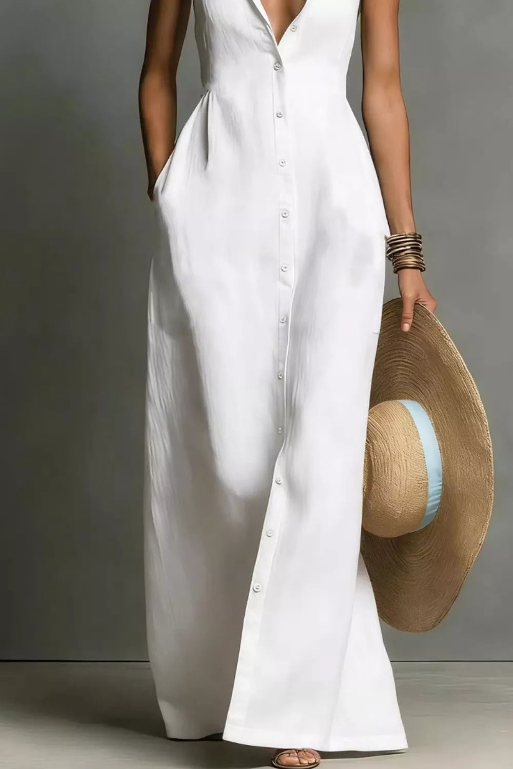 White sleeveless collared maxi shirt dress, side view showing the linen-look fabric and floor-length sweep.