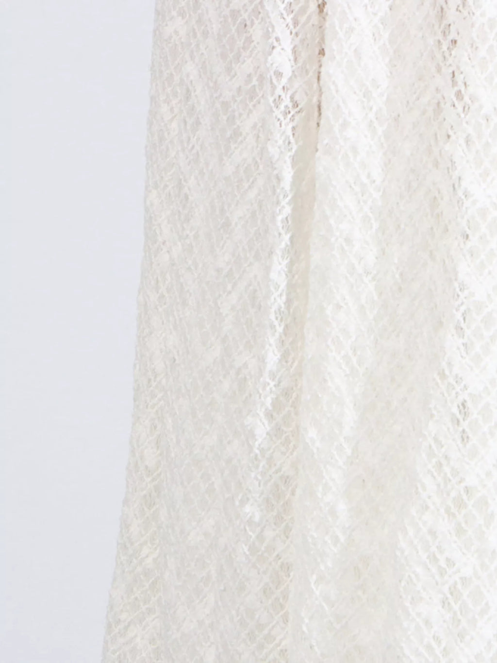 White textured-lace mock-neck maxi dress, full body styled view.
