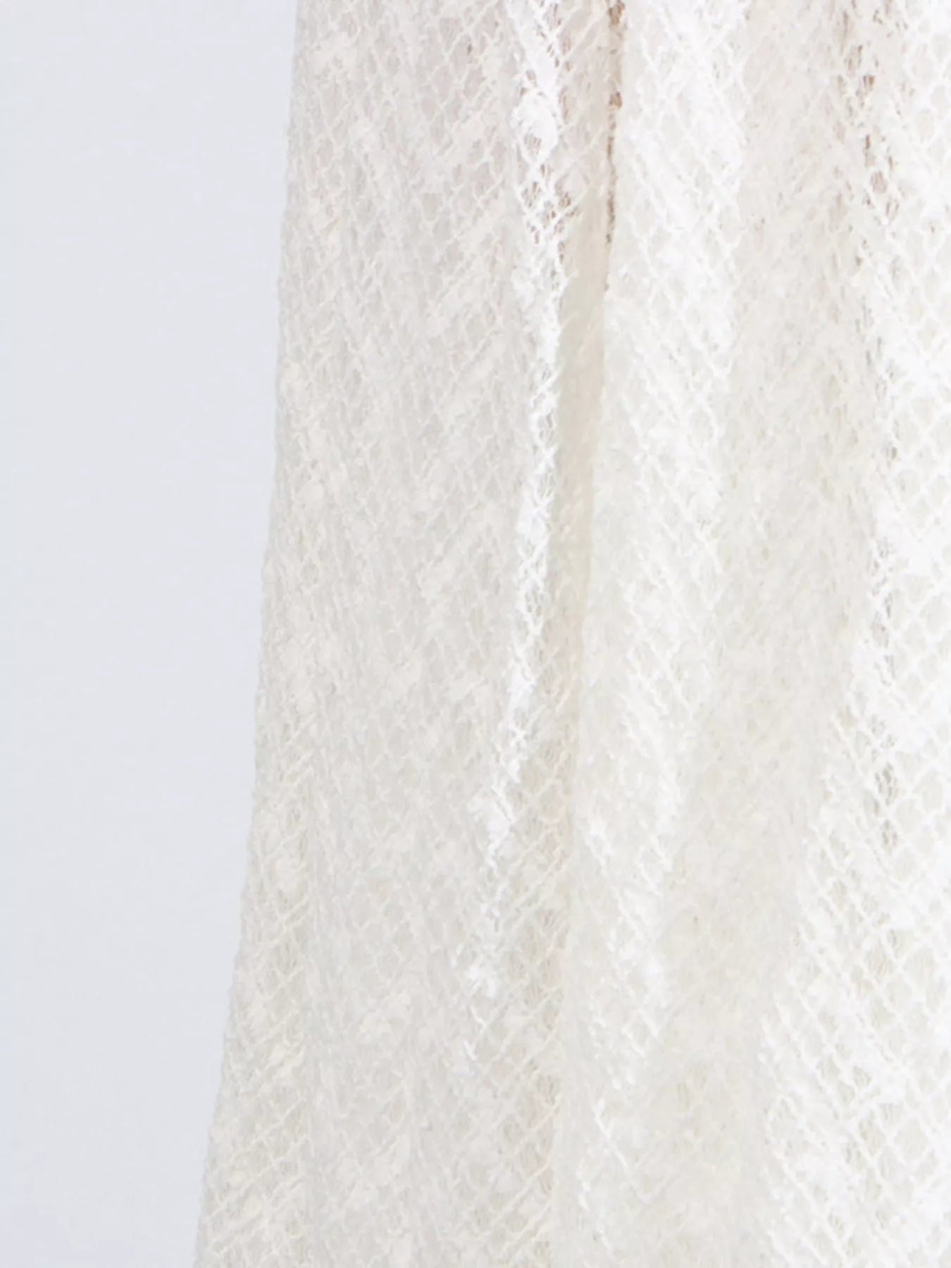 White textured-lace mock-neck maxi dress, full body styled view.